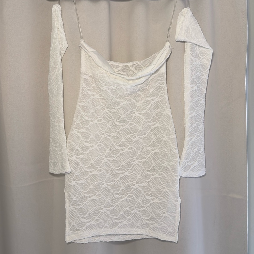 Short white lace dress with matching sleeves